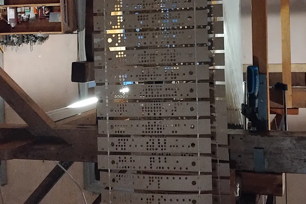 The 19th-century Jacquard technique used at Almgrens is based on weaving controlled by binary punch cards.