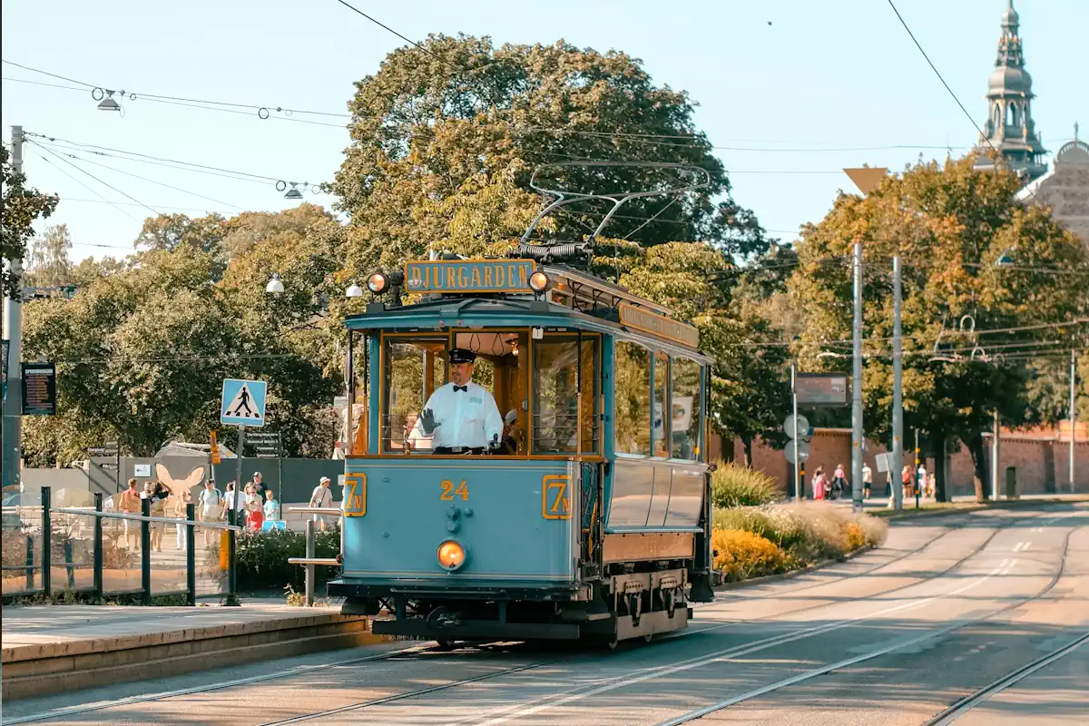 Vintage tram on Djurgården, Stockholm—with the Nordic Museum in the background.