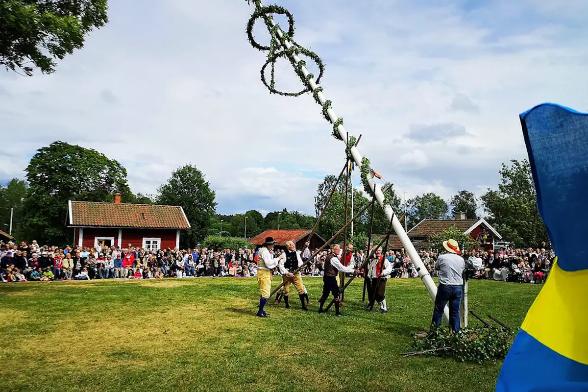 The raising of the midsummer pole at Västanfors Heritage Park in Fagersta.